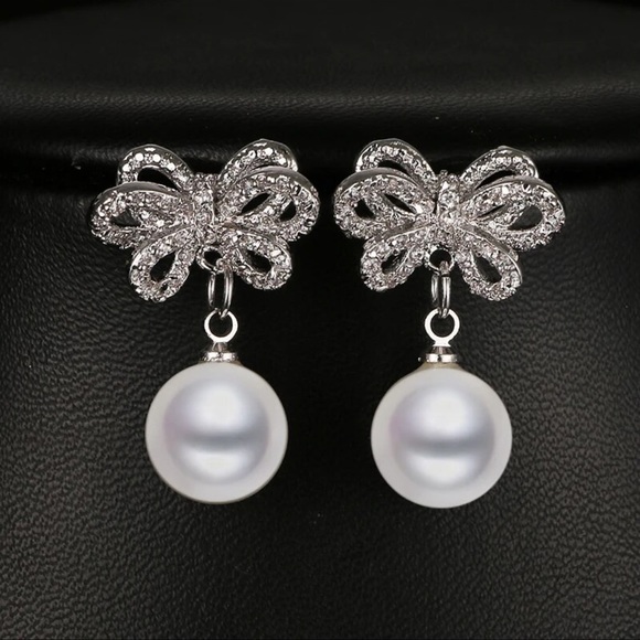 🌟 Sterling Silver Bow Elegant Simulated Pearl Drop Earrings - Picture 1 of 4